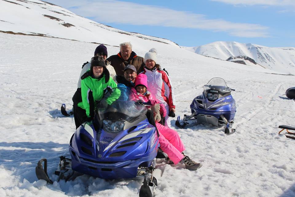 Snowmobile and slide Family tour